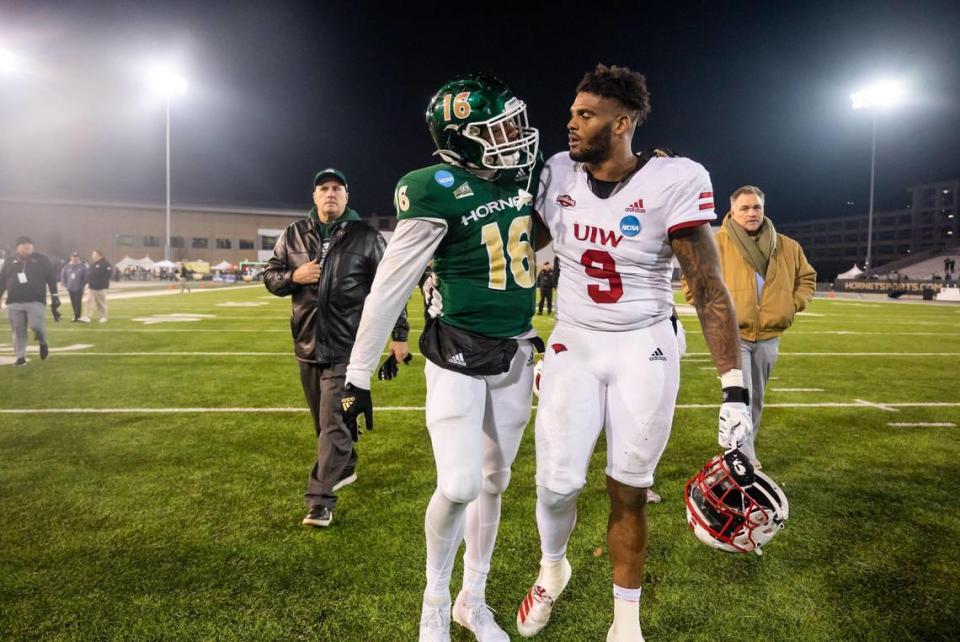 Incarnate Word Cardinals defensive lineman Zacchaeus McKinney (9) and Sacramento State Hornets tight end Marshel Martin (16) congratulate each other on a good game after the FCS quarterfinal playoff game Friday.