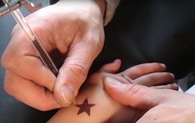 However the whole thing was fake and the star was actually being drawn on with a pen. Photo: YouTube