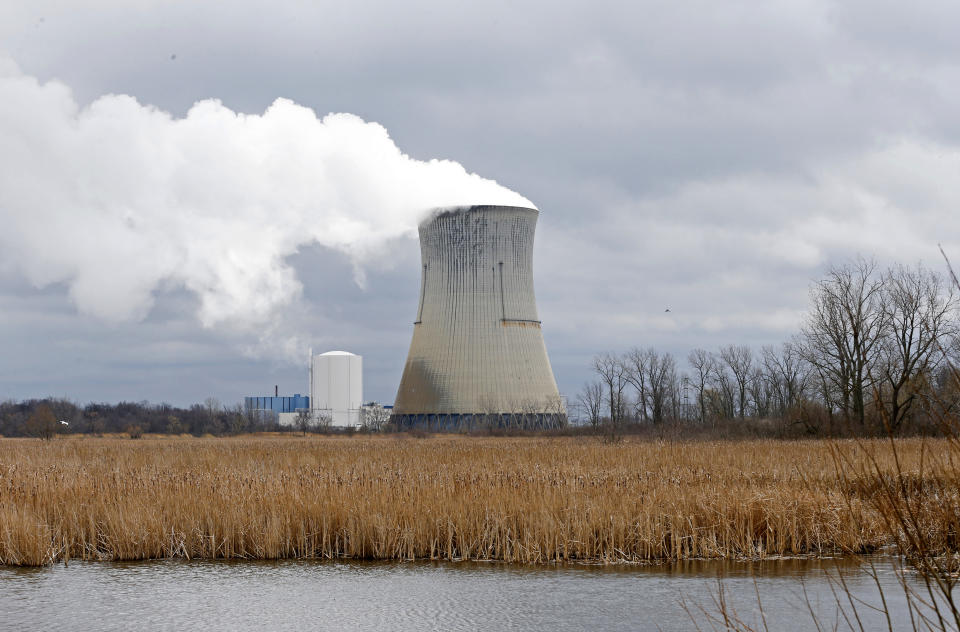 FILE – In this April 4, 2017, file photo, is the then-FirstEnergy Corp.'s Davis-Besse Nuclear Power Station in Oak Harbor, Ohio. The committee designated to determine the fate of the legislation that aimed to bailout Ohio's two nuclear plants adjourned Wednesday, Sept. 30, 2020, on the eve of the deadline to replace it before a fee is added to nearly every electricity bill in the state starting Jan 1, 2021. (AP Photo/Ron Schwane, File)