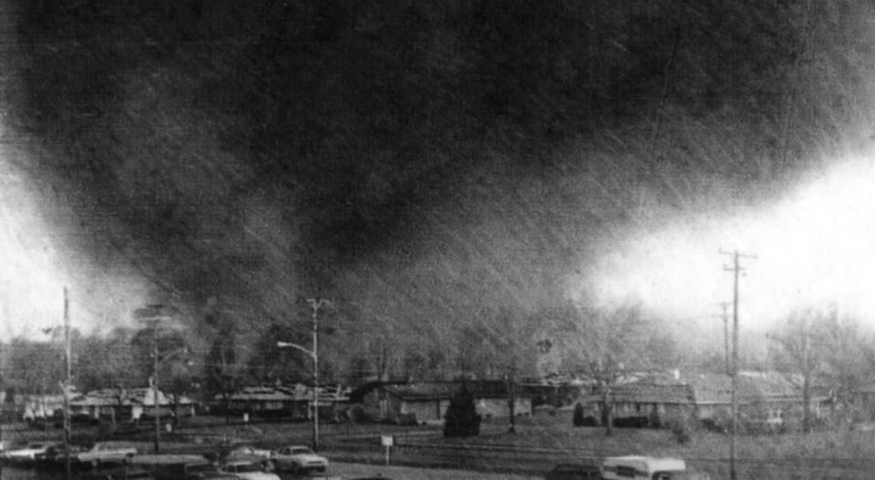 A tornado funnel is shown moving through Xenia in 1974.
