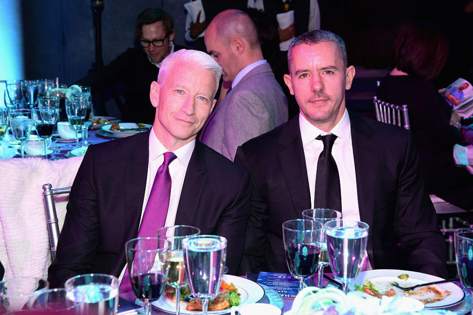 the two sitting at a table together for an event