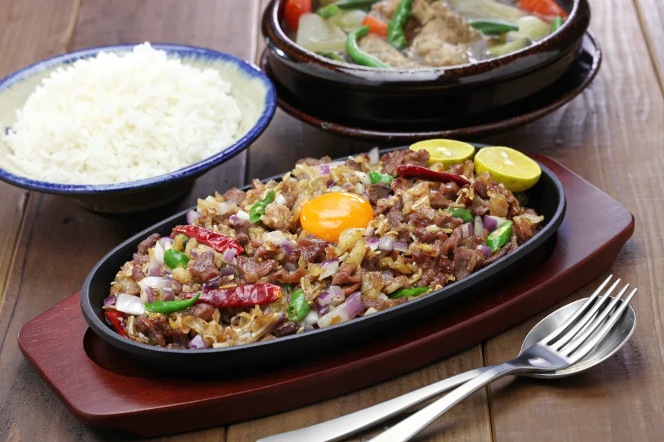 World's Best Soup 
pork sisig and sinigang, filipino cuisine