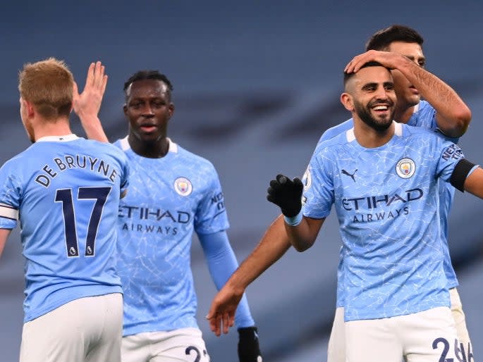 Riyad Mahrez celebrates with Rodrigo, Benjamin Mendy and Kevin De Bruyne  (Getty)