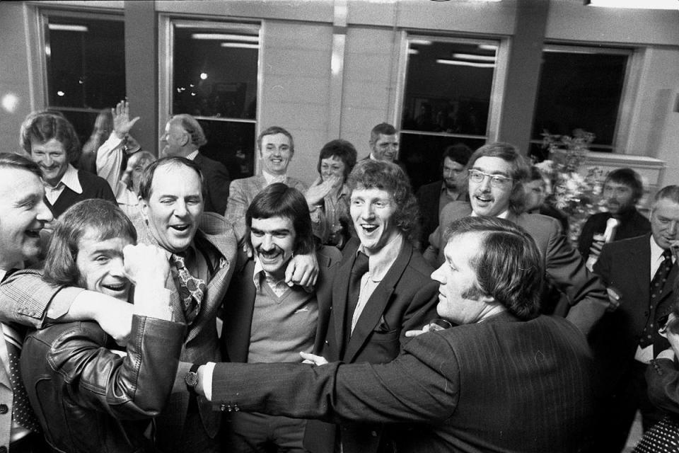 Carlisle United players and staff celebrate in the Cumberland Newspapers officers as news of their promotion comes through <i>(Image: News & Star)</i>