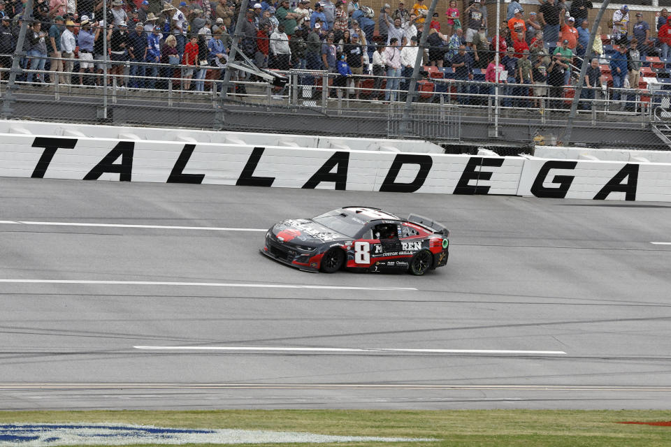 Kyle Busch drives to the finish line to win a NASCAR Cup Series auto race at Talladega Superspeedway, Sunday, April 23, 2023, in Talladega, Ala. (AP Photo/Butch Dill)