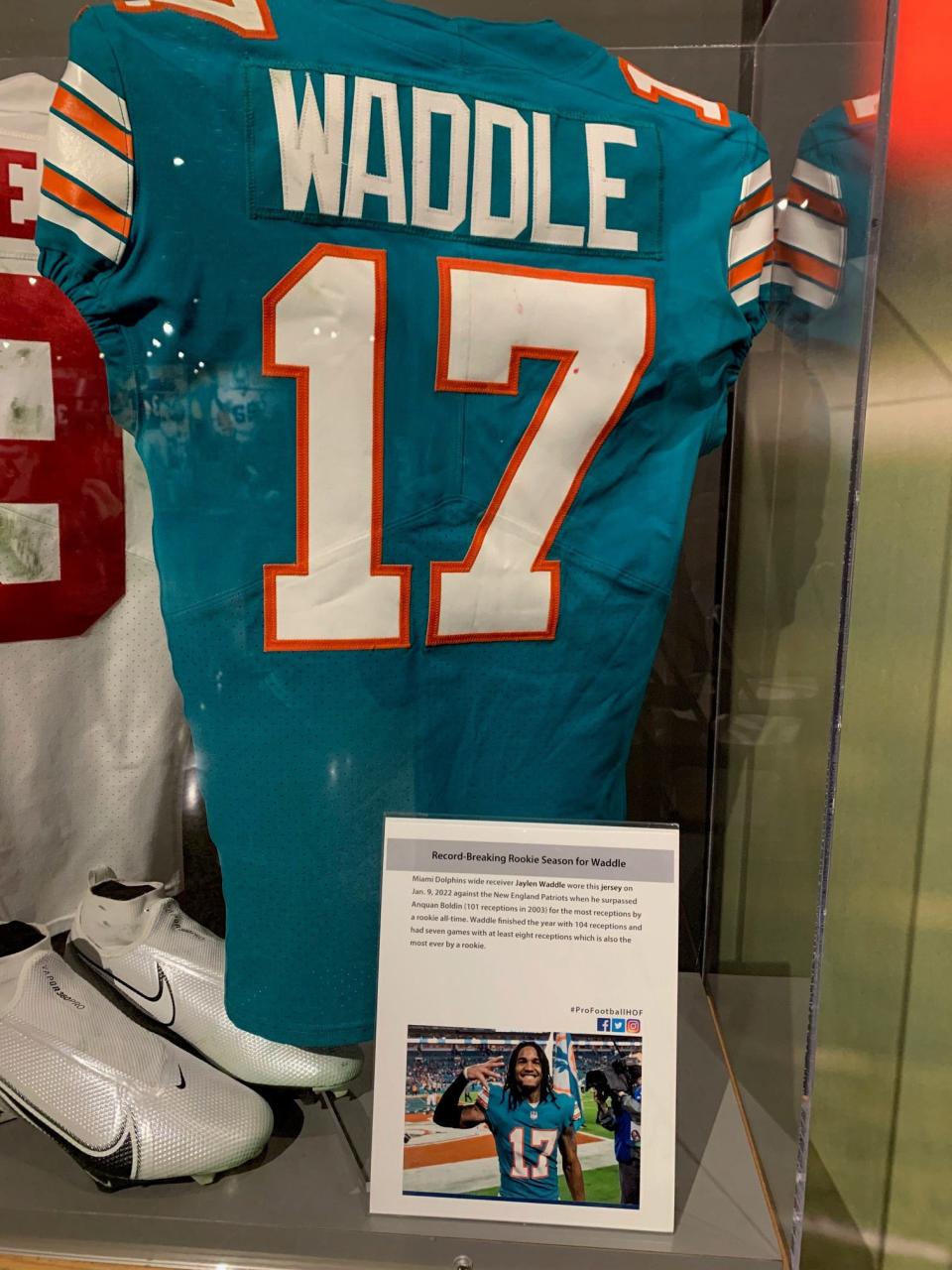 Jaylen Waddle's jersey from the season finale vs. New England is on display at the Pro Football Hall of Fame in Canton. (Pro Football Hall of Fame)