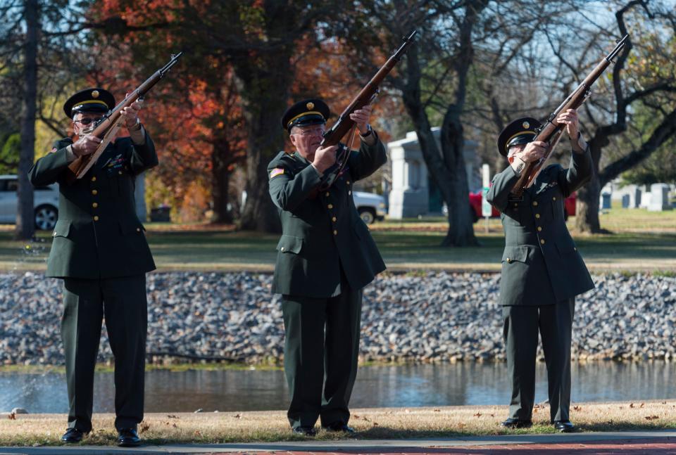 The Veterans Memorial Club performs a 21-gun salute during a Veterans Day ceremony at Oak Hill Cemetery in 2020.