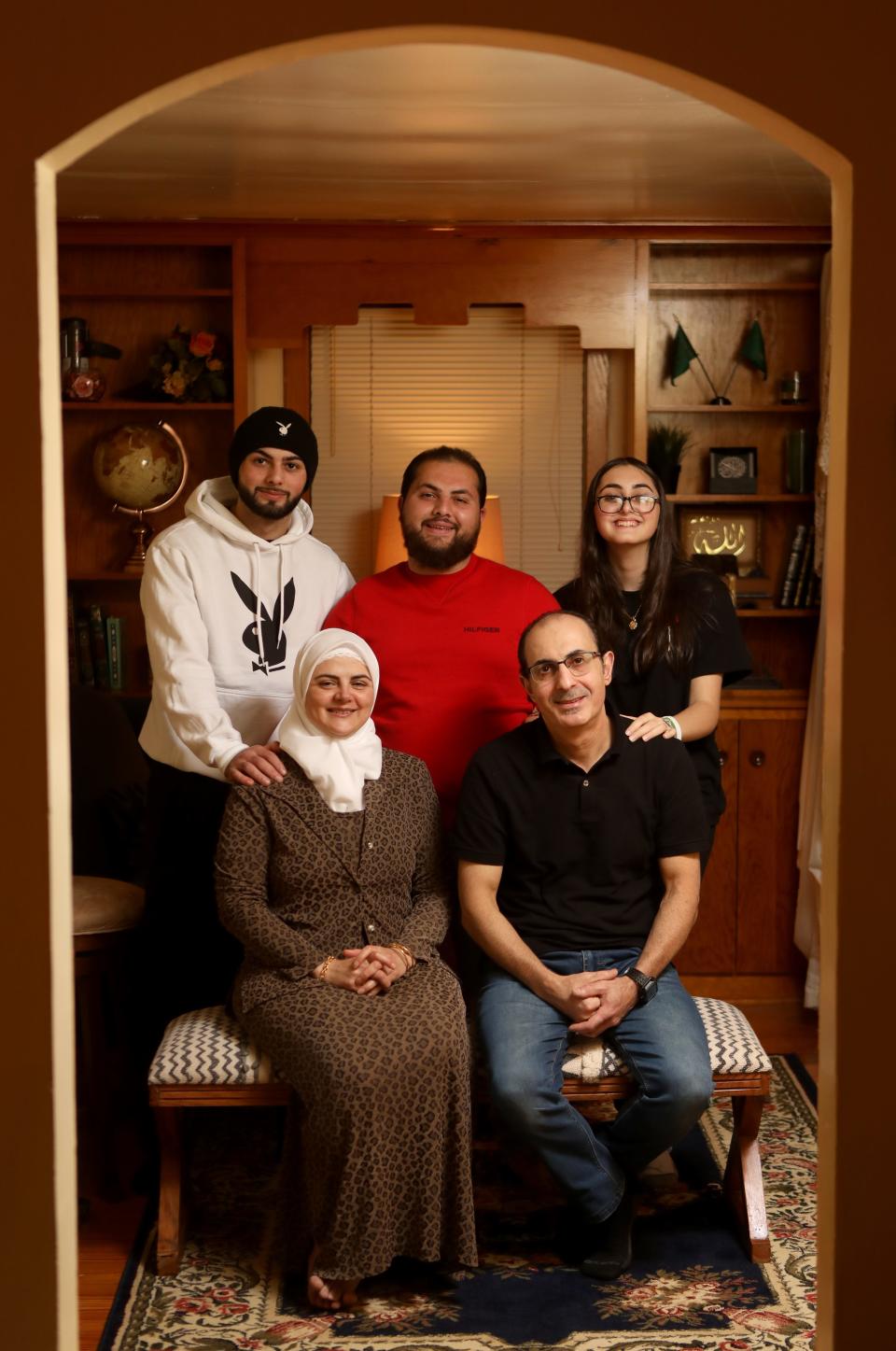 Sabah Abo Hamza and Mohanad Ghanam are shown with their children, Yazan Ghanam, 19, Ramez Ghanam, 21, and Nanse Ghanam, 14. The family arrived in New Jersey approximately five years ago as Syrian refugees. Thursday, Nov. 11, 2021.