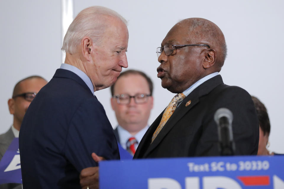 House Majority Whip, Rep. Jim Clyburn, D-S.C., greets Democratic presidential candidate and former Vice President Joe Biden, as he endorses him in North Charleston, S.C., Wednesday, Feb. 26, 2020. (AP Photo/Gerald Herbert)