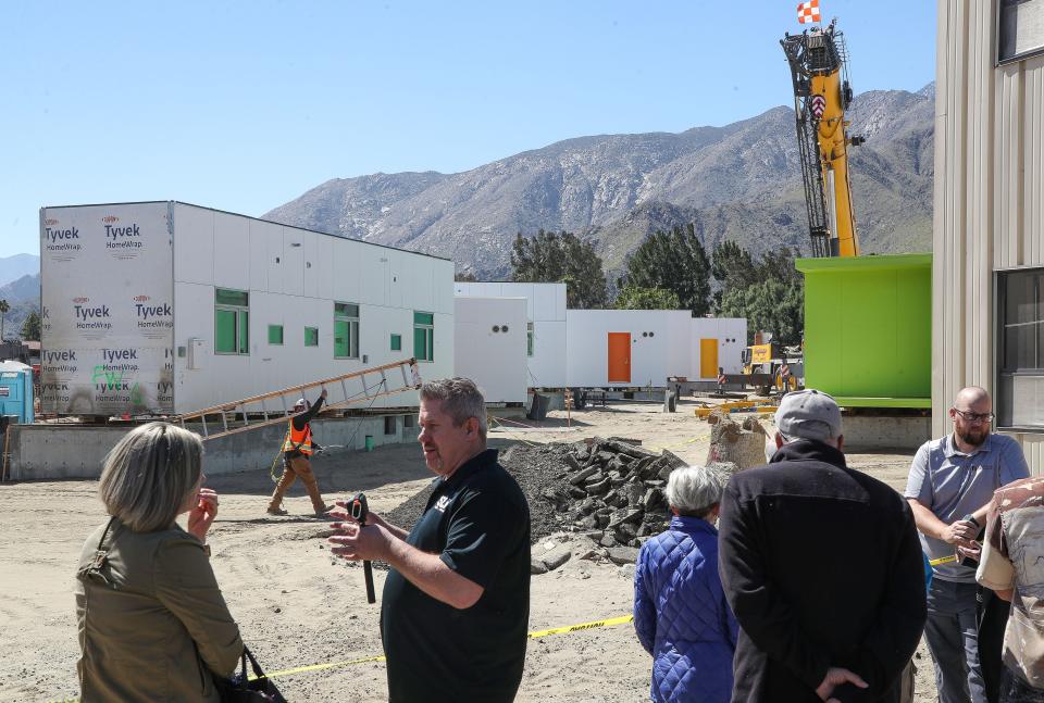 Modular homes are under construction at the Palm Springs homeless navigation center, as seen Tuesday.