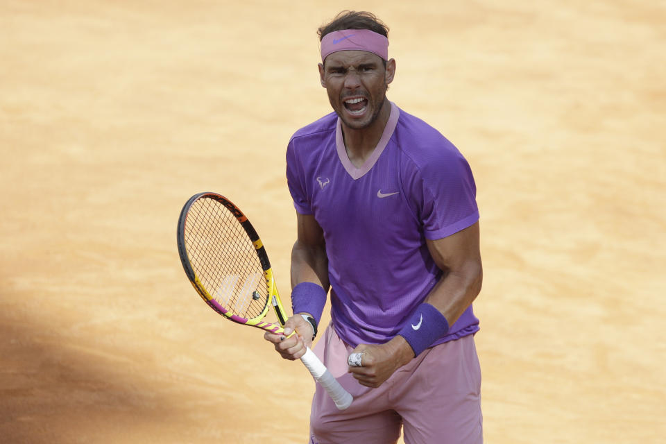 Spain's Rafael Nadal celebrates after winning his semi-final match against United States' Reiley Opelka at the Italian Open tennis tournament, in Rome, Saturday, May 15, 2021. (AP Photo/Gregorio Borgia)