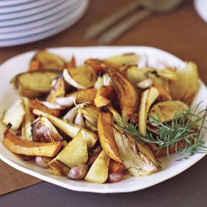 <p>This medley of roasted root vegetables features yellow onions, potatoes, turnips, carrots, parsnips, butternut squash, garlic, and sweet potatoes. For more hand-picked vegetable sides, see our complete <a href="https://www.myrecipes.com/vegetable-recipes/" rel="nofollow noopener" target="_blank" data-ylk="slk:vegetable recipe;elm:context_link;itc:0;sec:content-canvas" class="link ">vegetable recipe</a> collection. </p><p><a href="https://www.myrecipes.com/recipe/oven-roasted-fall-vegetables" rel="nofollow noopener" target="_blank" data-ylk="slk:Oven-roasted Fall Vegetables Recipe;elm:context_link;itc:0;sec:content-canvas" class="link ">Oven-roasted Fall Vegetables Recipe</a></p>