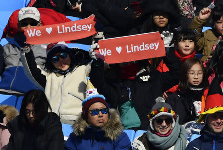 Alpine Skiing - Pyeongchang 2018 Winter Olympics - Women's Alpine Combined - Jeongseon Alpine Centre - Pyeongchang, South Korea - February 22, 2018 - Fans hold up signs for Lindsey Vonn of the U.S. as she competes in the Women's Downhill part of the Women's Alpine Combined. REUTERS/Toby Melville