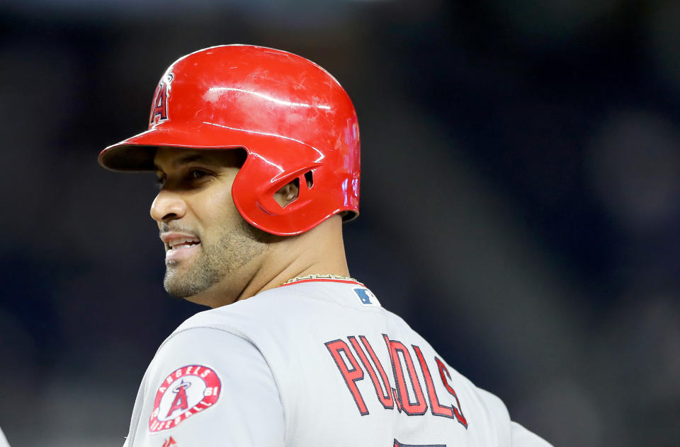 NEW YORK, NEW YORK - SEPTEMBER 18:  Albert Pujols #5 of the Los Angeles Angels stands on first base after he drove in a run with a hit in the sixth inning against the New York Yankees at Yankee Stadium on September 18, 2019 in the Bronx borough of New York City. (Photo by Elsa/Getty Images)