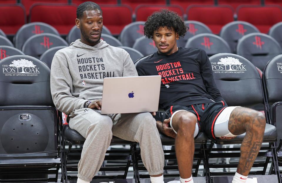 Houston Rockets assistant Royal Ivey, left, speaks with guard Jalen Green before a home game against Miami on April 5. Ivey has led the South Sudan to an Olympic berth in his fourth year as head coach. Longtime friend Luol Deng hired him in 2021 to coach the team.