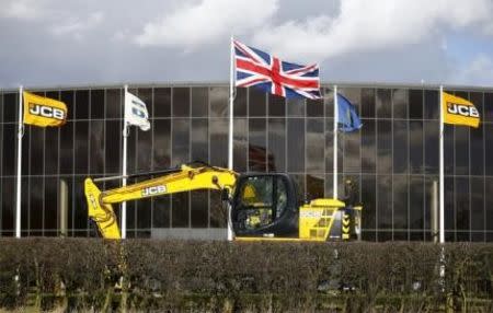 A Union flag flies at the JCB factory in Uttoxeter, central England, March 3, 2015. Picture taken March 3, 2015. REUTERS/Darren Staples