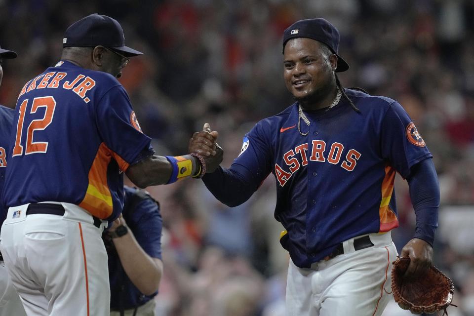 Houston Astros starting pitcher Framber Valdez, right, is congratulated by manager Dusty Baker Jr. (12) after throwing a no-hitter against the Cleveland Guardians, Tuesday, Aug. 1, 2023, in Houston. (AP Photo/Kevin M. Cox)