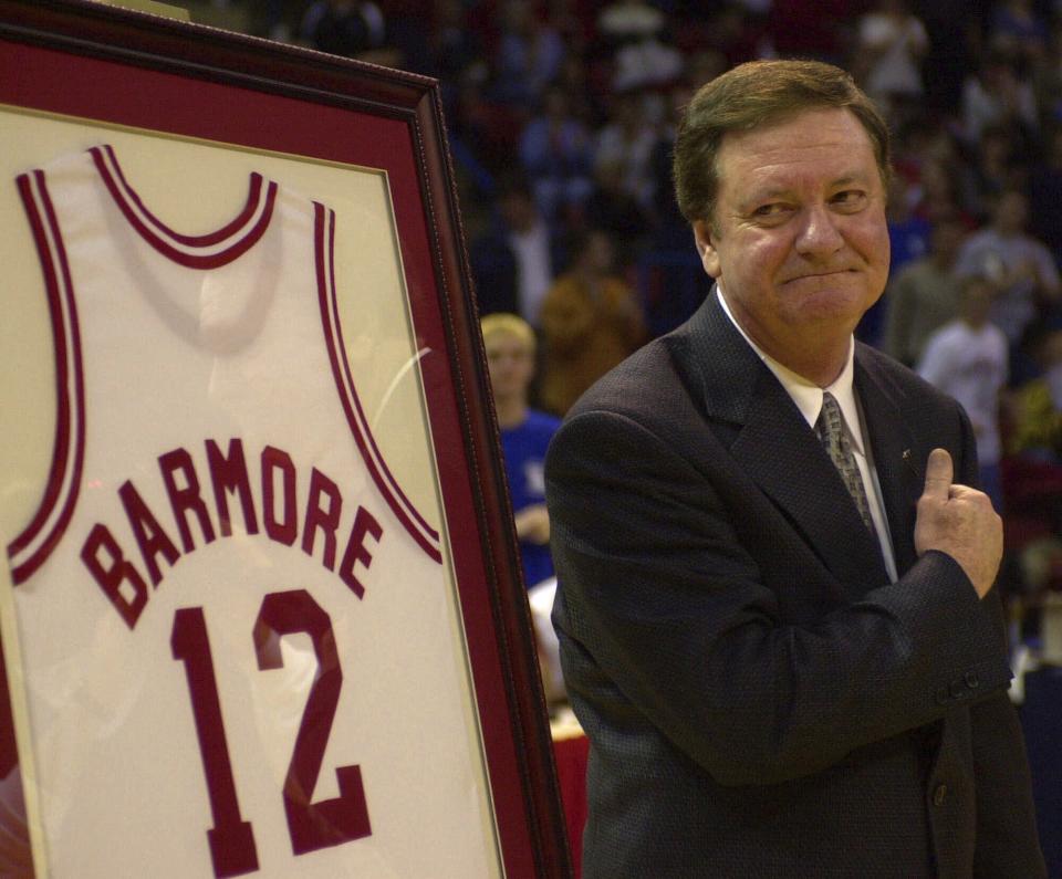 FILE - Louisiana Tech basketball coach Leon Barmore looks towards his wife during halftime of a Connecticut at Louisiana Tech NCAA college basketball game where his No. 12 jersey was retired Sunday night Jan. 7, 2001, in Ruston, La.(AP Photo/Bill Haber, File)