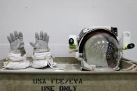 The gloves and helmet of NASA Commercial Crew astronaut Sunita William's space suit are shown at NASA's Neutral Buoyancy Laboratory (NBL) training facility near the Johnson Space Center in Houston,