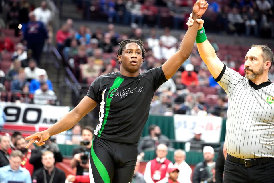 Dublin Coffman's e'Than Birden celebrates winning a second consecutive Division I state title.