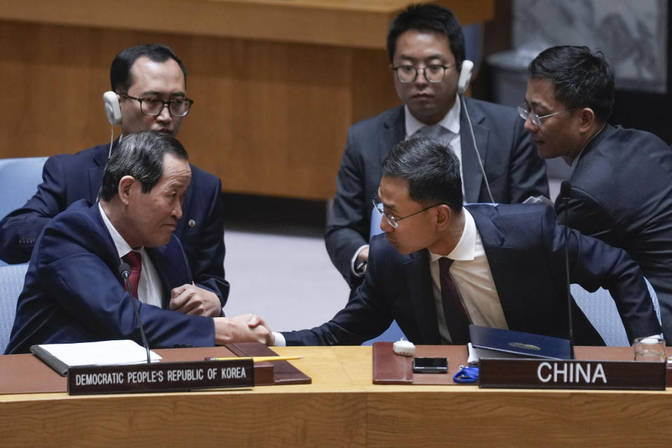 Chinese deputy ambassador to the United Nations Geng Shuang, right, shakes hands with North Korean ambassador to the UN Song Kim at the end of a Security Council meeting at United Nations headquarters, Friday, June 28, 2024. (AP Photo/Seth Wenig)