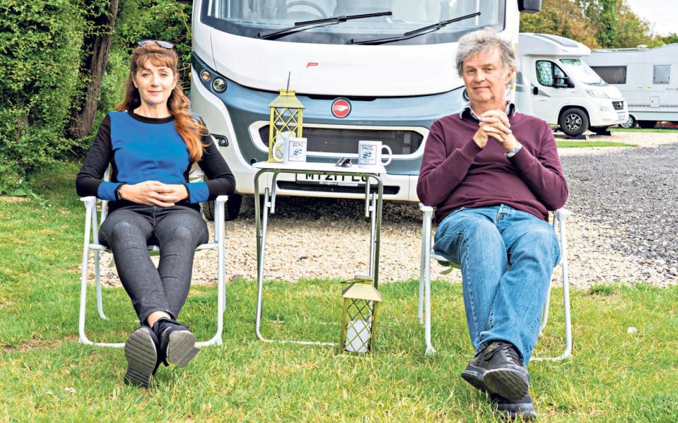 Paul Merton and his wife, Suki Webster, enjoy a cuppa in front of their motorhome - Emily Barker / Curve Media
