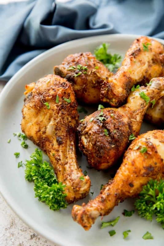 <p>Wholesome Made Easy</p><p>These drumsticks are extra easy thanks to the air fryer. Simply reheat for a quick lunch, or cold chicken can by yummy too! </p><p><strong>Get the recipe:</strong><a href="https://wholesomemadeeasy.com/air-fryer-chicken-drumsticks/" rel="nofollow noopener" target="_blank" data-ylk="slk:Air Fryer Chicken Drumsticks;elm:context_link;itc:0;sec:content-canvas" class="link rapid-noclick-resp"> <strong>Air Fryer Chicken Drumsticks</strong></a></p>