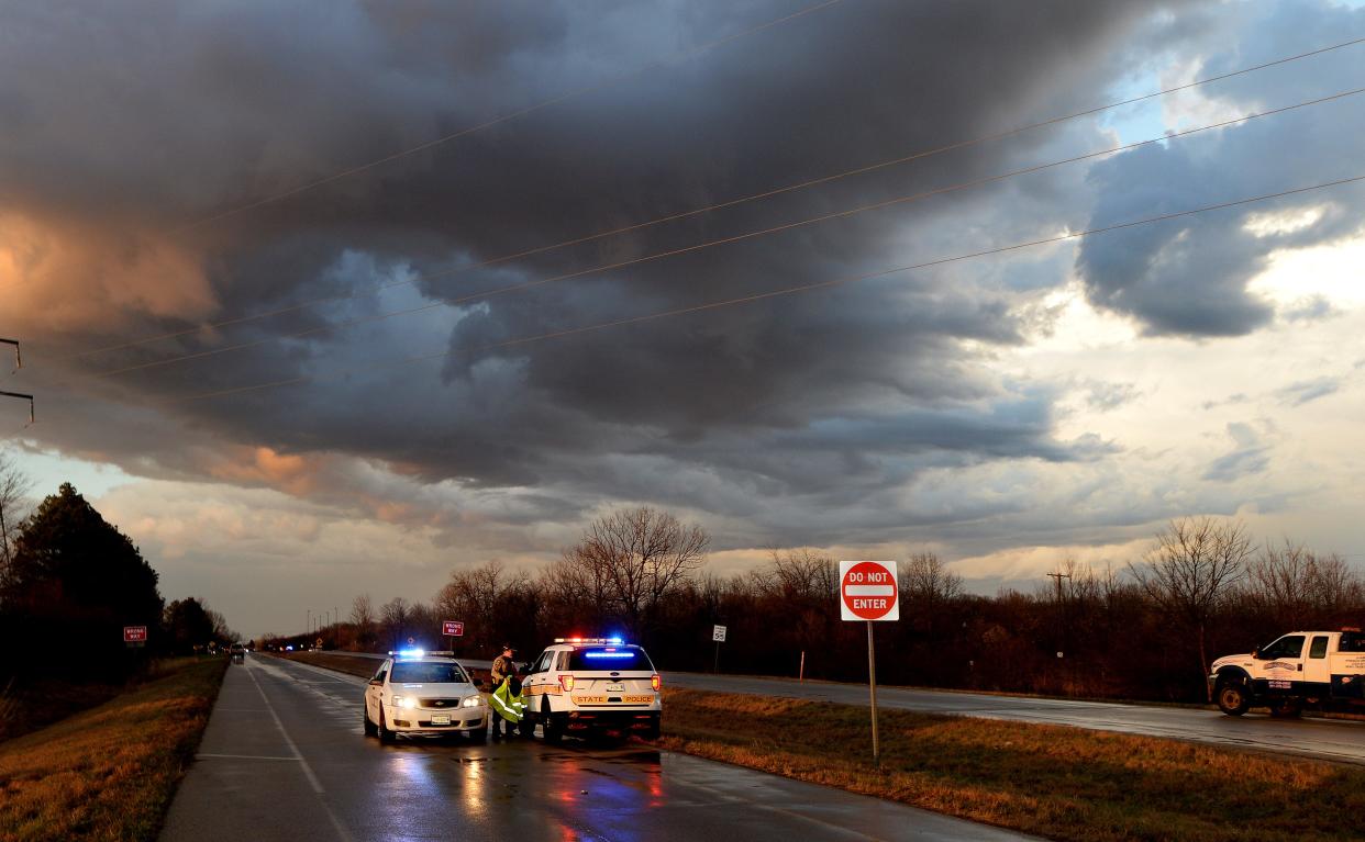 Police authorities  block off Sherman Blvd. in Sherman because of reported gas leaks from storm damage Friday, March, 31, 2023.