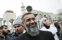 Activist Anjem Choudary leaves London Central Mosque after speaking at a rally calling for British Muslims not to vote as part of the Stay Muslim Don't Vote campaign in London April 3, 2015. REUTERS/Suzanne Plunkett