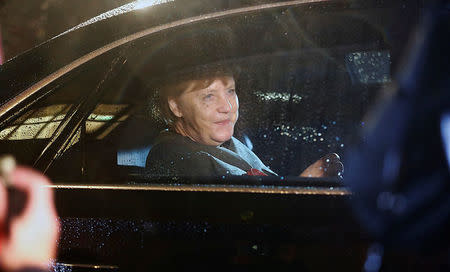 German Chancellor Angela Merkel of the Christian Democratic Union (CDU) leaves the German Parliamentary Society after exploratory talks about forming a new coalition government in Berlin, Germany, November 17, 2017. REUTERS/Hannibal Hanschke