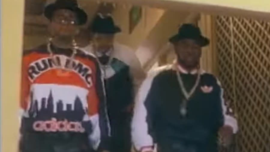Hip-hop pioneers Run-DMC quickly descend stairs in a late 1980s Adidas commercial. The signs of hip-hop’s influence are everywhere, but it didn’t start out that way. Even though the company had seen an unusual spike in sales of its Superstar shoes in the Northeast in 1986, it wasn’t ready to attribute that to Run-DMC and their hit, “My Adidas.” When company execs saw the group ask fans to show off their Adidas at a Madison Square Garden performance, and thousands removed their shoes and waved them in the air, they were sold. They signed the rap group to a $1 million deal that resulted in their own shoe line in 1988. (Photo: Screenshot/YouTube.com/baaadmutha75)
