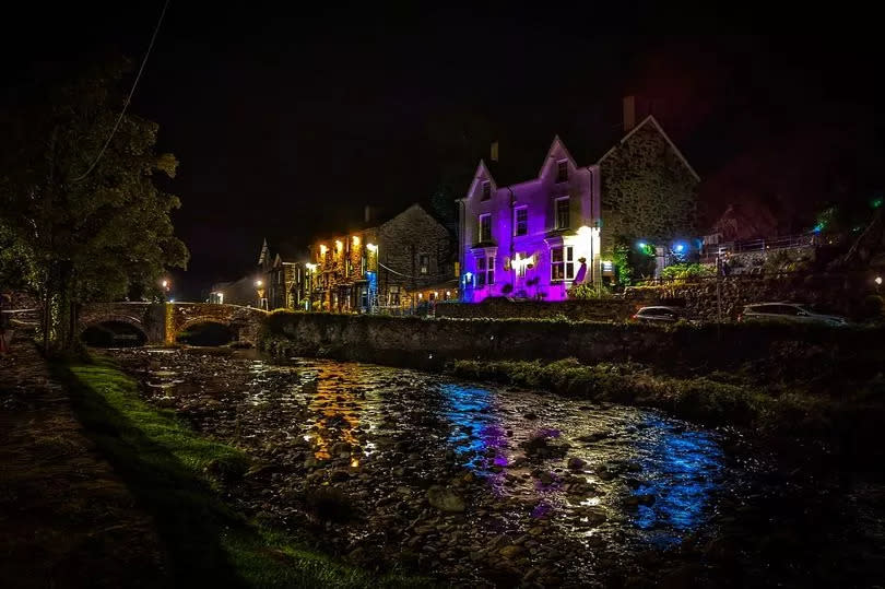 Riverside buidings lit up at night