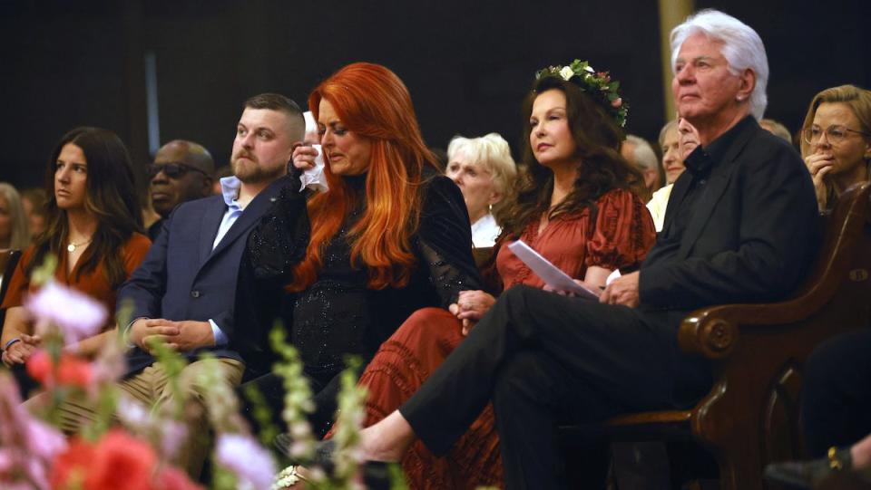 Wynonna Judd, sister Ashley Judd, and Larry Strickland attend attend 