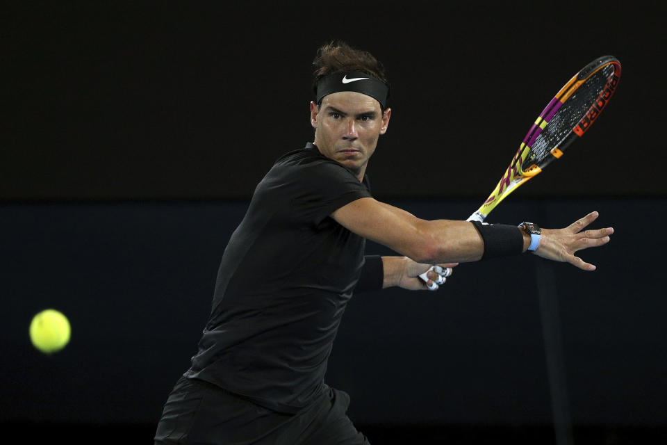 Rafael Nadal of Spain plays a forehand during his singles match against Ricardas Berankis of Lithuania at Summer Set tennis tournament ahead of the Australian Open in Melbourne, Australia, Thursday, Jan. 6, 2022. (AP Photo/Hamish Blair)