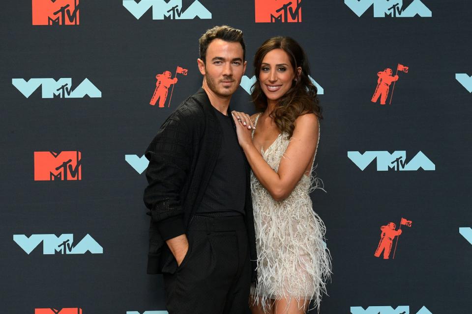 Kevin Jonas and his wife at the video music awards