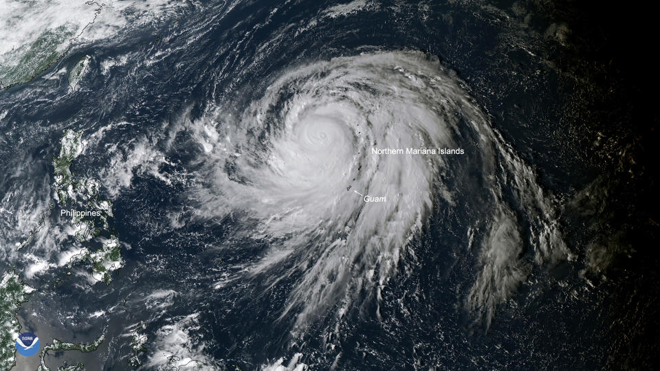 This Oct. 8, 2019, satellite image provided by the National Oceanic and Atmospheric Administration (NOAA) shows Typhoon Hagibis over Guam and Northern Mariana Islands. Japan’s weather agency is warning a powerful typhoon may bring torrential rains to central Japan over the weekend. (NOAA via AP)