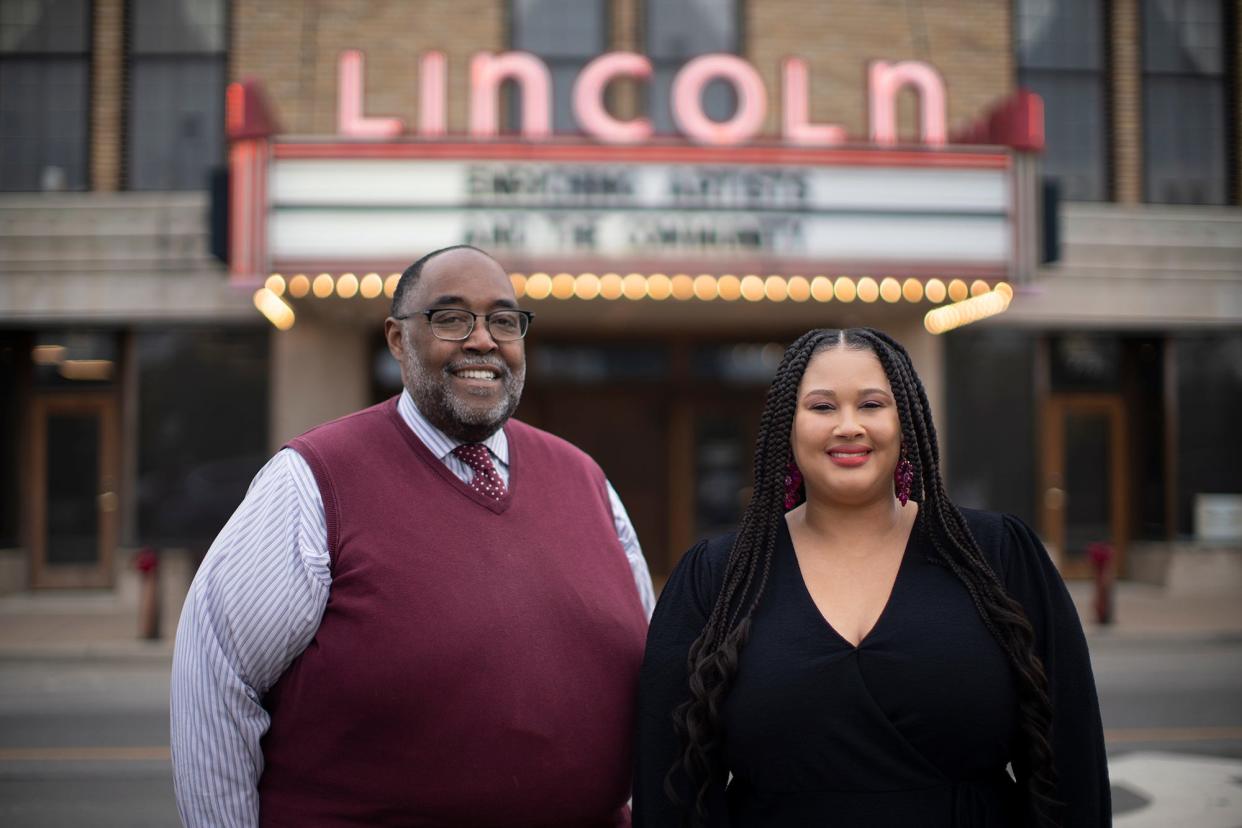 Milton Ruffin, choral director of the Milton Ruffin Gospel Chorale, and Destiny Coleman, Converging Arts Columbus board member, pose in front of the Lincoln Theatre. Both are involved in the production of "The Journey: Civil Rights," which will be performed on Saturday.