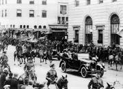 President Calvin Coolidge rides in an open car at the head of the inaugural parade with his wife Grace and Chief Justice Wiliam H. Taft in Washington, D.C., on March 4, 1925. (AP Photo)