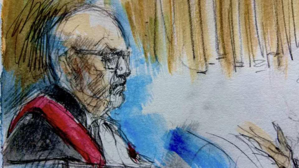 Justice Bruce Thomas, shown Thursday during pretrial legal arguments in a London, Ont., court, is overseeing the motions by lawyers representing five former members of Canada's world junior hockey team. The players have all been charged with sexual assault stemming from 2018. (Pam Davies/CBC)