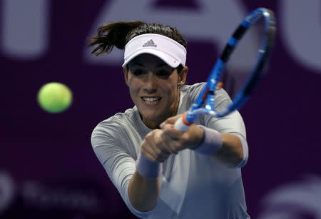 Tennis - WTA Premier 5 - Qatar Open - Finals - Doha, Qatar - February 18, 2018. Gabrine Muguruza of Spain is seen in action against Petra Kvitova of Czech Republic. REUTERS/Ibraheem Al Omari