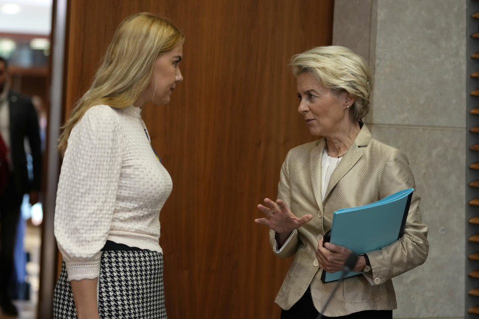 European Commission President Ursula von der Leyen, right, speaks with European Commissioner for Energy Kadri Simson during the weekly College of Commissioners meeting at EU headquarters in Brussels on Wednesday, Sept. 28, 2022. The European Union suspects that damage to two underwater natural gas pipelines was sabotage and is warning of retaliation for any attack on Europe's energy networks, EU foreign policy chief Josep Borrell said Wednesday. (AP Photo/Virginia Mayo)