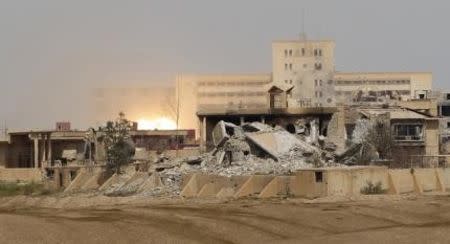 An air strike on a hospital is pictured in Tikrit March 27, 2015. U.S. and coalition forces conducted 10 air strikes against Islamic State fighters in Iraq during a 24-hour period, while U.S. forces led six air strikes in Syria, the U.S. military said on Friday. REUTERS/Thaier Al-Sudani