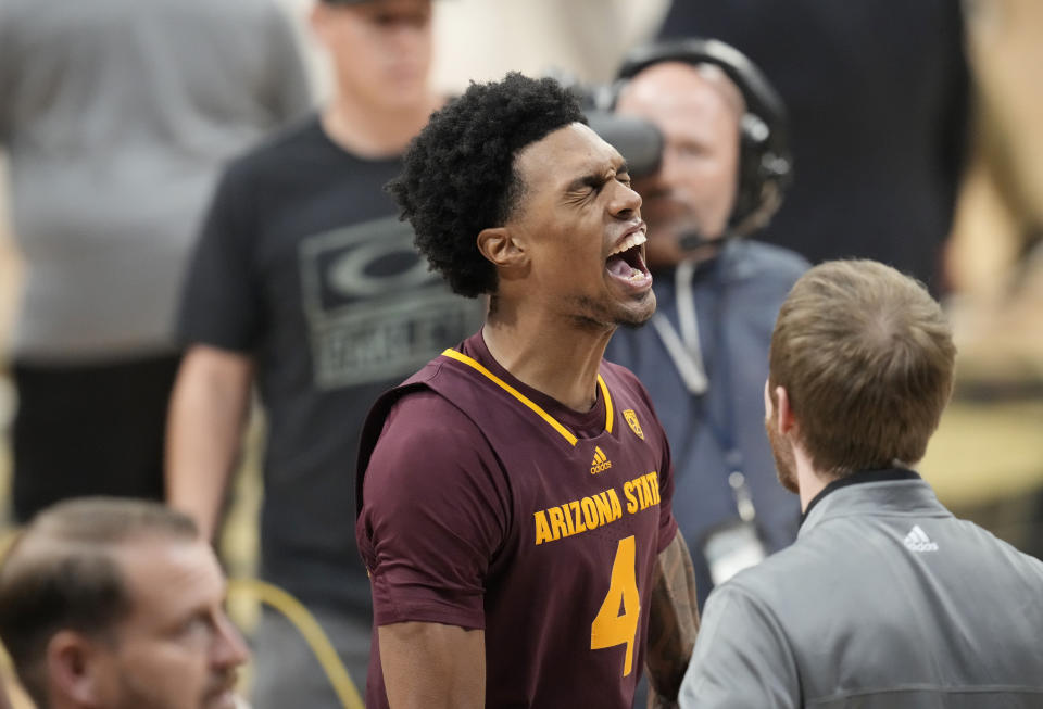 Arizona State guard Desmond Cambridge Jr. yells as he leaves the court after an NCAA college basketball game against Colorado, Thursday, Dec. 1, 2022, in Boulder, Colo. (AP Photo/David Zalubowski)