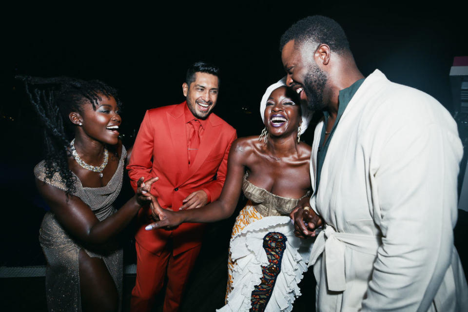 Lupita, Tenoch, Danai, and Winston smiling together