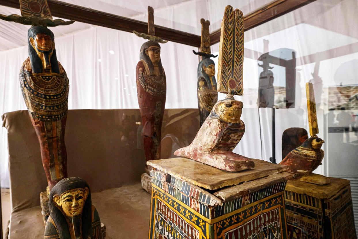 Objects are displayed at the Saqqara necropolis in Egypt (Khaled Desouki / AFP via Getty Images)