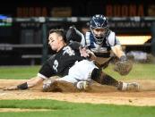 Apr 26, 2019; Chicago, IL, USA; Chicago White Sox catcher James McCann (33) slides home in front of the tag of Detroit Tigers catcher Grayson Greiner (17) during the fifth inning at Guaranteed Rate Field. Mandatory Credit: Mike DiNovo-USA TODAY Sports