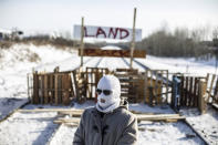 Supporters of the Wet'suwet'en who are against the LNG pipeline, block a Canadian National Railway line just west of Edmonton, Alberta, on Wednesday, Feb. 19, 2020. (Jason Franson/The Canadian Press via AP)