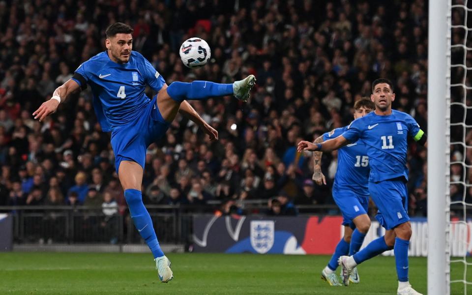 Konstantinos Mavropanos clears the ball away