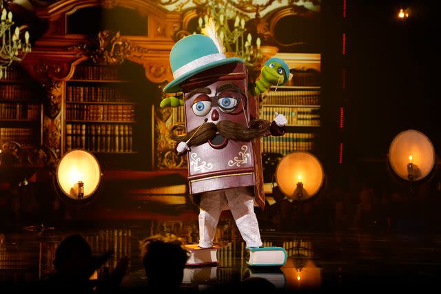 <p>Michael Becker / FOX</p> Book in the season 11 premiere episode of 'The Masked Singer'