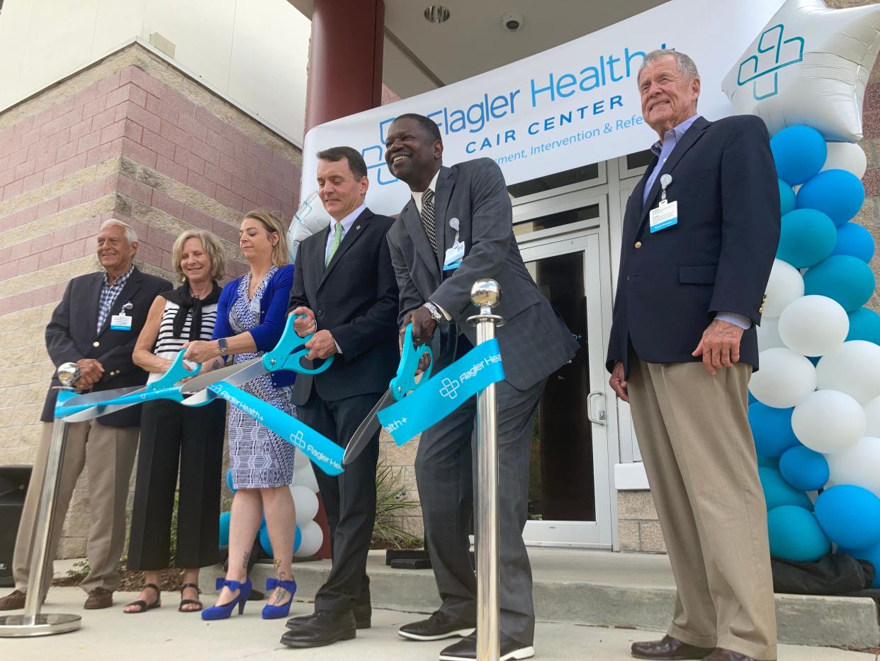 Flagler Health+ board members and administrators cut the ribbon at the Crisis Assessment Intervention and Referral Center at Flagler Hospital on Thursday morning. From left: Board members Ray Matuza and Karen Taylor; Valerie Duquette, who is in charge of the behavioral health department at Flagler Health+; CEO and President Carlton DeVooght; Chief Operating Officer Vincent Johnson; and board member Bill Abare.